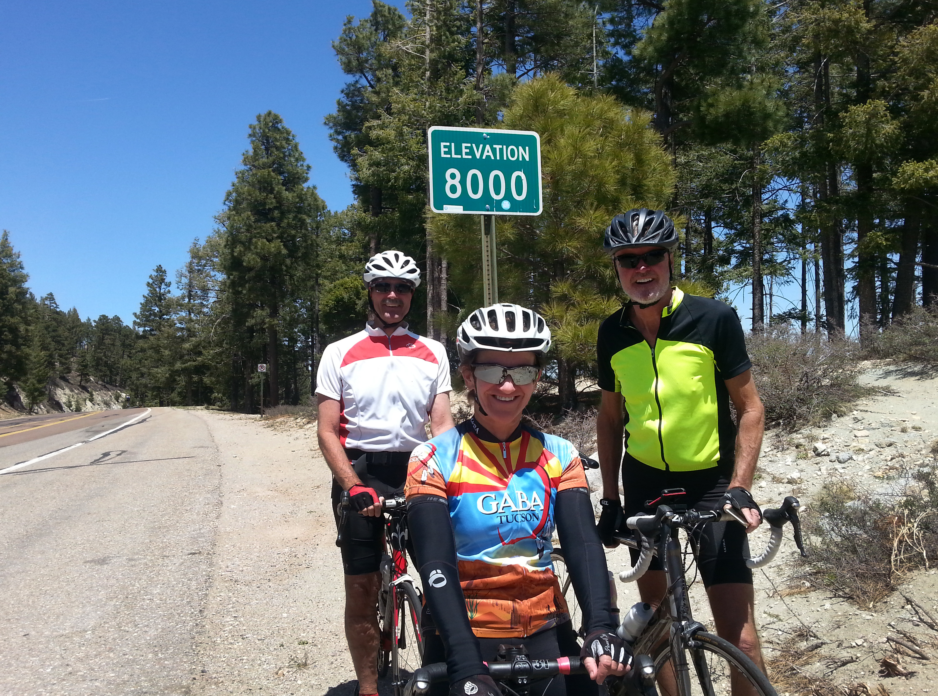 Kathleen Bober, Brian and Dave cycling on Mt. Lemmon Highway, elevation 8000 feet